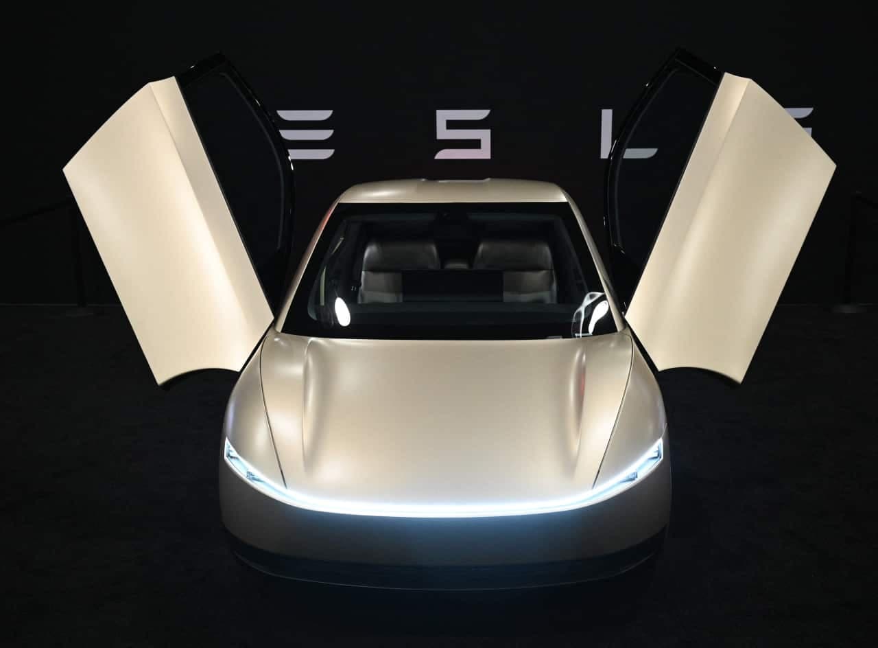 Tesla Investors Pose Burning Questions Ahead of Q Earnings