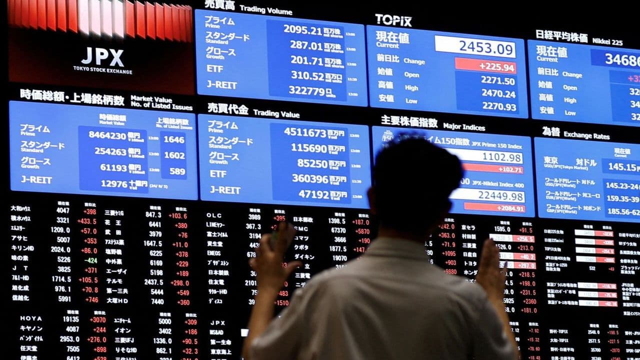 Fed Expectations Boost Asian Markets While China's Growth Slows